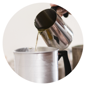 Pouring wax to make a Milan Candle