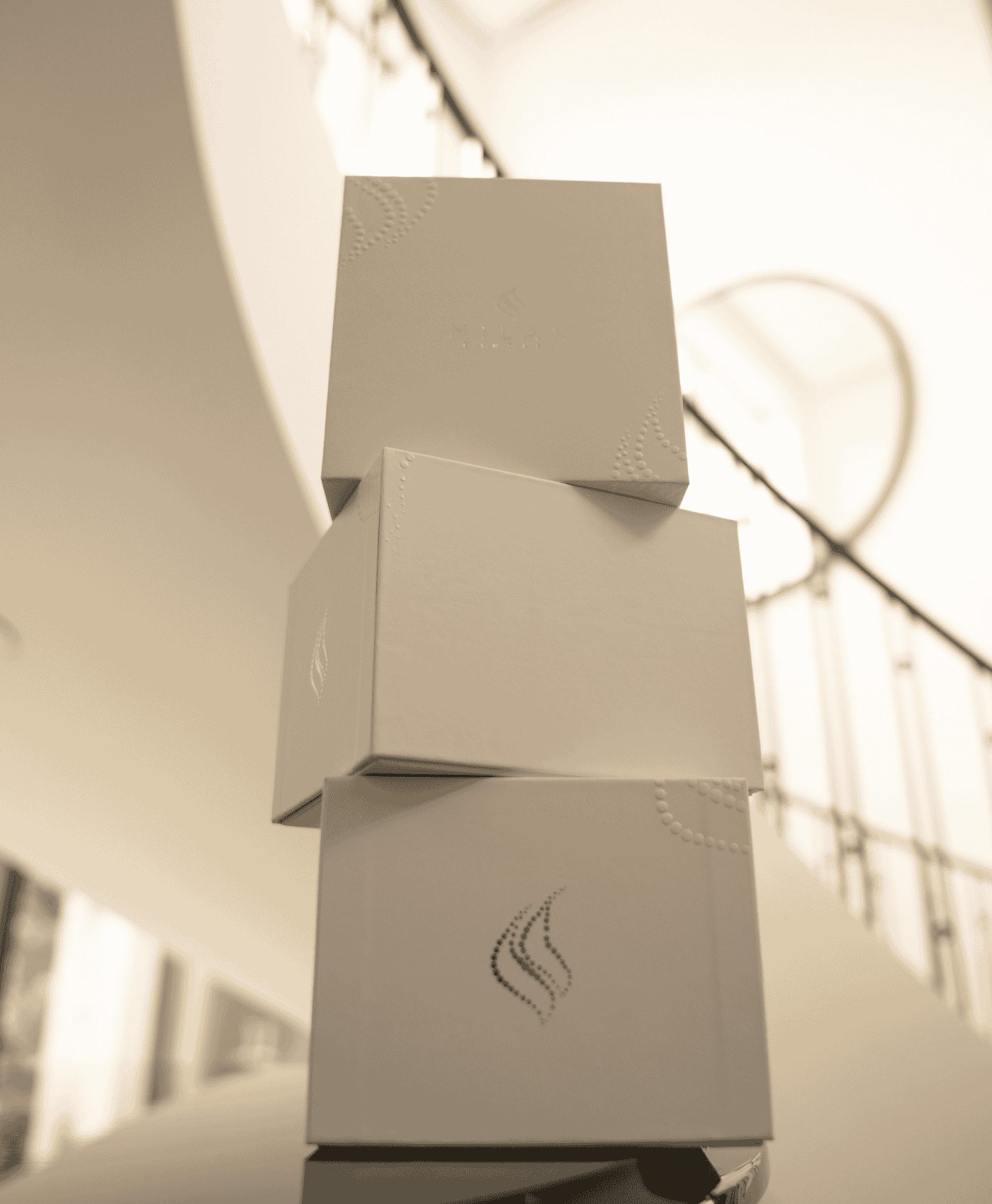 Stack of beautiful Milan Candles boxes