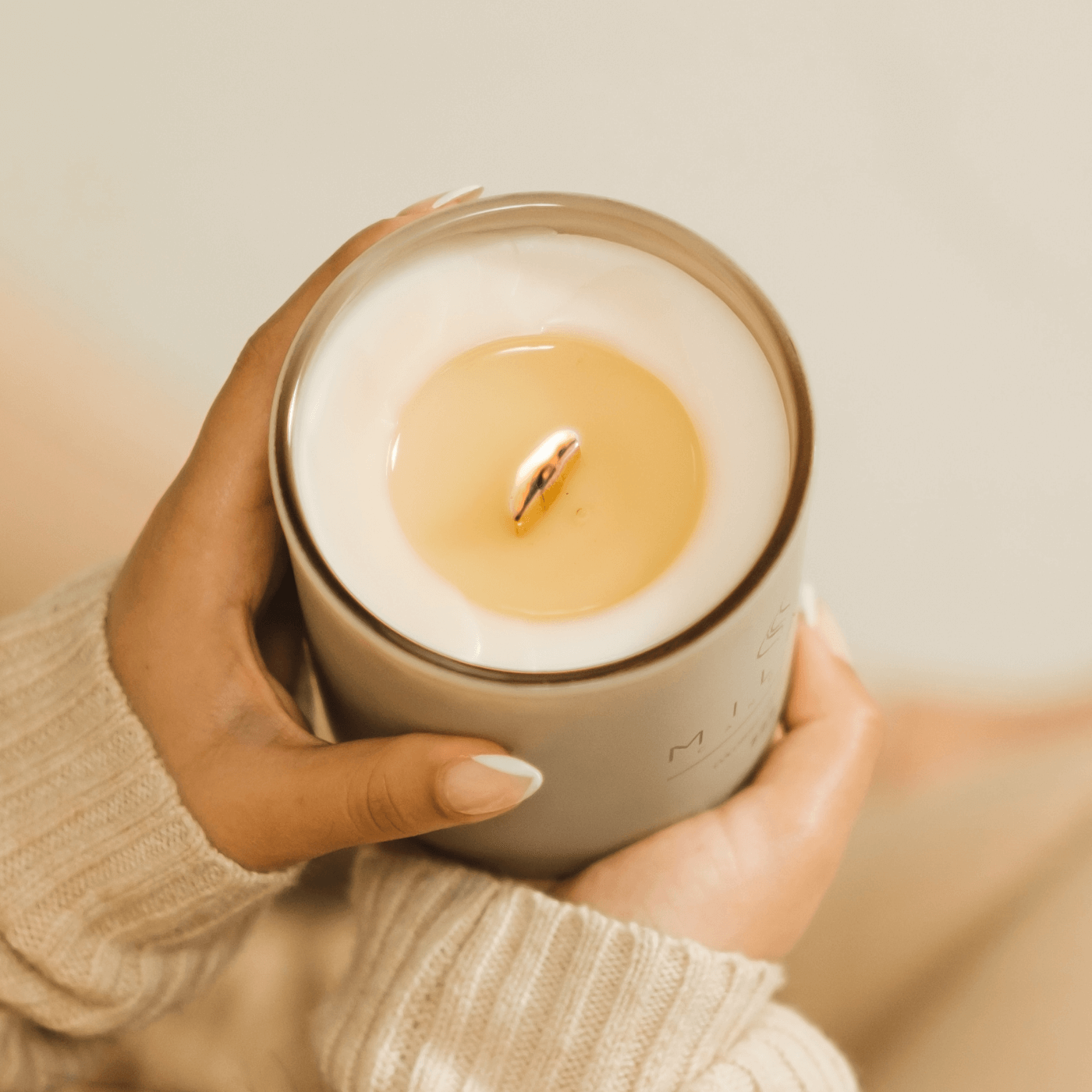 The wooden wick and finish of a Milan candle